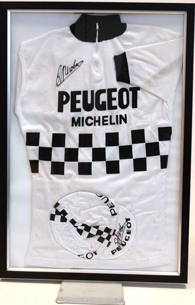 Image of Replica Peugeot-Michelin jersey and cap, both signed by Eddy Merckx.